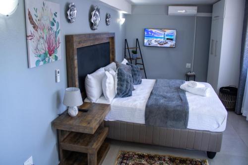 Rehoboth Ezulwini Suitesにあるベッド