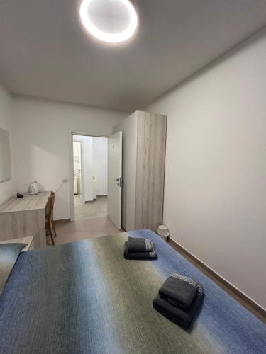 Postel nebo postele na pokoji v ubytování *Veranda's rooms* - Free parking in central Lugano