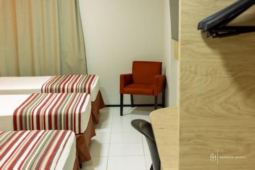 Ein Bett oder Betten in einem Zimmer der Unterkunft Rede Andrade SLZ