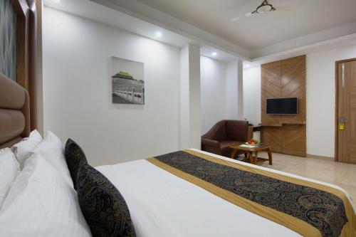 Телевизор и/или развлекательный центр в The Lohmod - a Luxury Boutique Hotel - Free One way Airport Cab