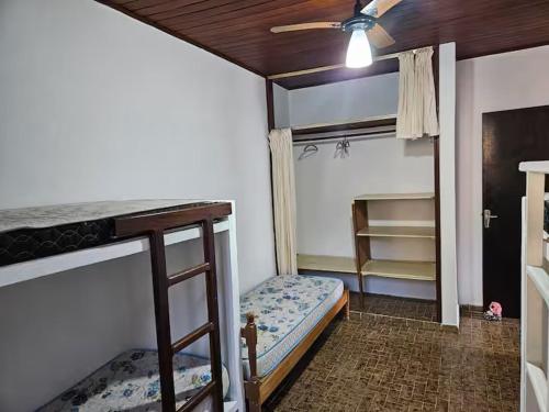 Ένα ή περισσότερα κρεβάτια σε δωμάτιο στο Cantinho Jango