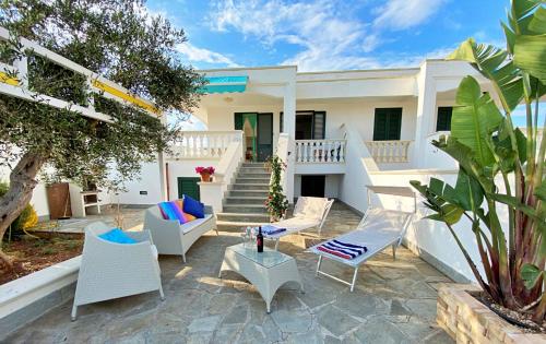 マリーナ・ディ・ペスコルーゼにあるCasa Bauhaus - Design E Comfort A 400 M Dalla Spiaggia Di Pescoluseのギャラリーの写真