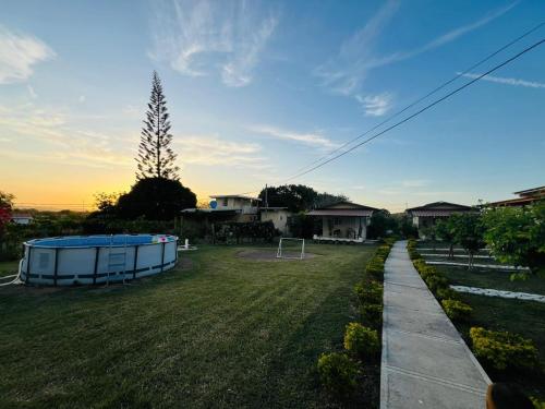 a view of a yard with a gazebo at Hotel VILLAS DON PABLO LAS TABLAS in Las Tablas