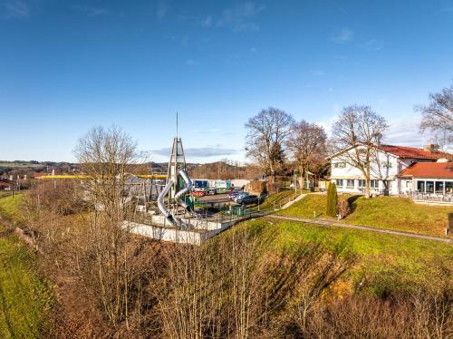 an aerial view of a park with a playground at Hotel Irschenberg Süd in Irschenberg