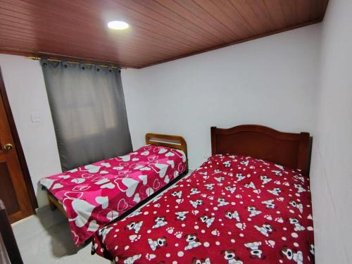 Ein Bett oder Betten in einem Zimmer der Unterkunft Casa Palchacual