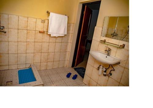 Koupelna v ubytování Bujumbura Hotel and Appartment