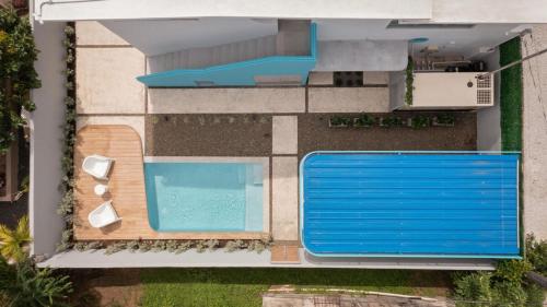 Πισίνα στο ή κοντά στο Aquabella 2 Ocean Breeze Getaway in Isla Verde