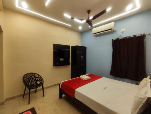 Un ou plusieurs lits dans un hébergement de l'établissement Shree Ramalinga Residency