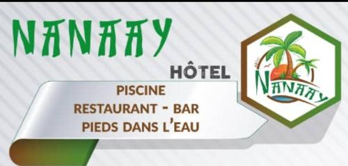 a sign for a kimney hotel with a palm tree at Hôtel Nanaay in Palmarin