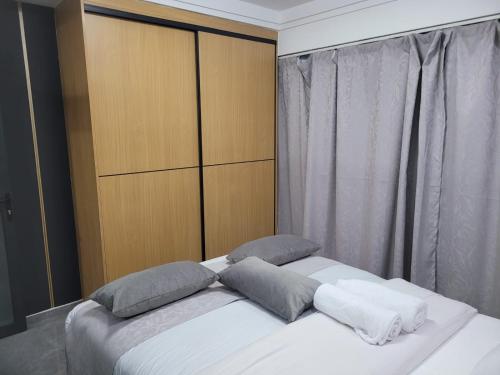 Postel nebo postele na pokoji v ubytování Ajema facility management