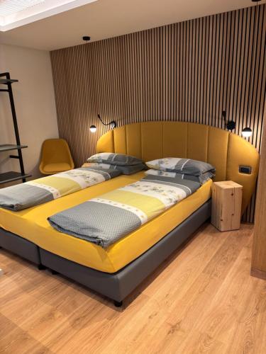 A bed or beds in a room at Hotel Piccolo Mondo