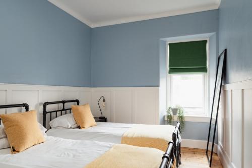 Katil atau katil-katil dalam bilik di 50TheHighstreet by The House of Danu