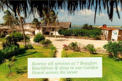 a sign that reads restore all services at t beachfront and sleep in our garden at Garden House - Ilha do Guajiru in Itarema