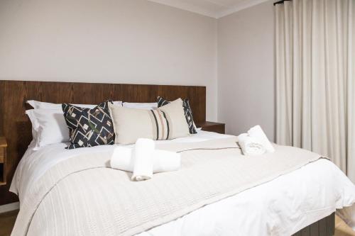 Кровать или кровати в номере Skinkikofi Guest House