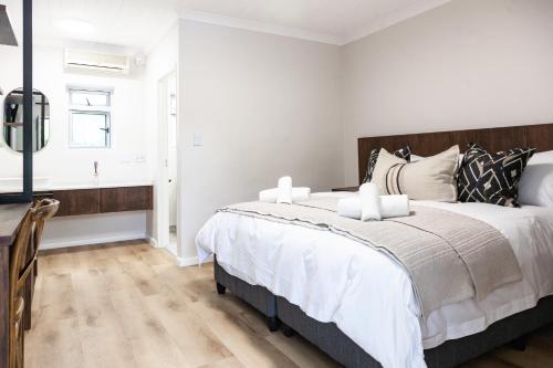 Кровать или кровати в номере Skinkikofi Guest House