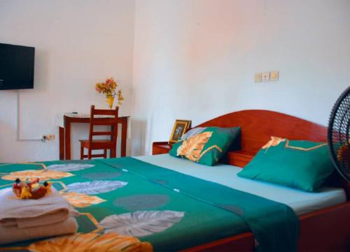 Postel nebo postele na pokoji v ubytování Phimex Tours Lodge