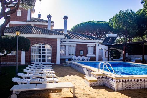 The swimming pool at or close to LUXURY STYLE VILLA AURORA Roche