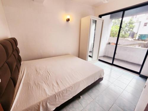 Ένα ή περισσότερα κρεβάτια σε δωμάτιο στο Modern Stay, Prime Location !