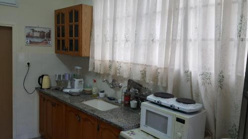 Una cocina o zona de cocina en Zohar's Apartment
