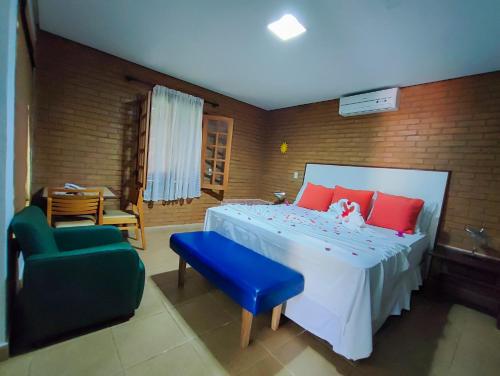 Ένα ή περισσότερα κρεβάτια σε δωμάτιο στο Vila Velluti Hotel