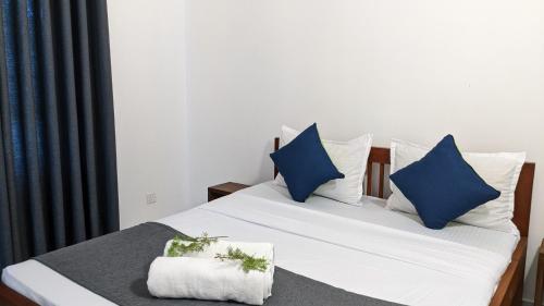 Ένα ή περισσότερα κρεβάτια σε δωμάτιο στο Bellezza Home stay
