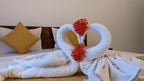 Ένα ή περισσότερα κρεβάτια σε δωμάτιο στο Bellezza Home stay