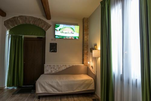 Ένα ή περισσότερα κρεβάτια σε δωμάτιο στο Hotel Residence Diamantina