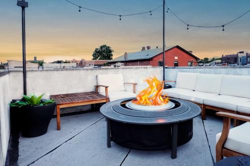 a fire pit on top of a roof at Trio Sonata, 3-Bed Rock n Roll Residence in Northern Liberties in Philadelphia