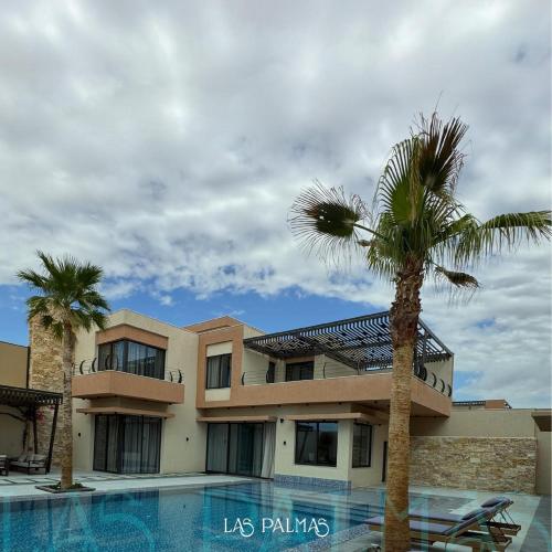Bazén v ubytování Las palmas resort nebo v jeho okolí