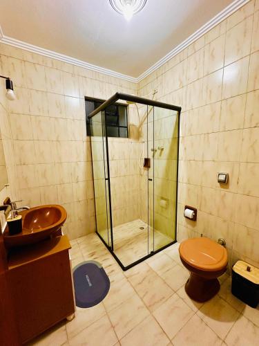 a bathroom with a shower and a toilet and a sink at LAquolina in Socorro