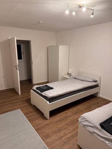 a bedroom with two beds in a room at Rebhof Bahlingen Ferienwohnung Nr 17 Silvaner in Bahlingen