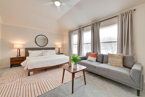 a bedroom with a bed and a couch at 4 Mi to Dtwn Family Home with Games in Frisco in Frisco