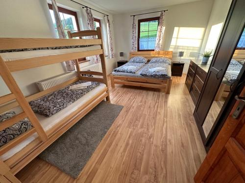 Postel nebo postele na pokoji v ubytování Apartmany215
