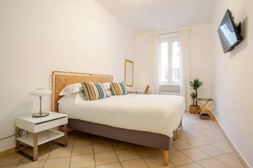 Giường trong phòng chung tại Terrazza San Lorenzo - Luxury Apartment - Roma Centro