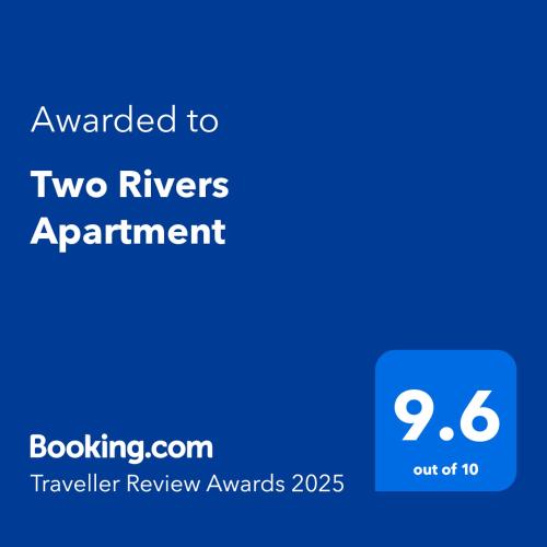 uno screenshot dell'esperimento dei due fiumi con il testo che premia l'esperimento dei due fiumi di Two Rivers Apartment a Belgrado