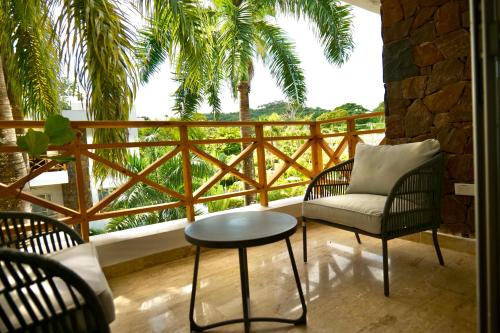 Balkoni atau teres di JardinesDelMontSerrat-LasTerrenas-NearBeach Cozy 2BR-3BDS-6PAX-WiFi