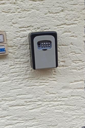 a black and white object on the side of a wall at Ferienwohnung mit Terrasse für 1-4 Personen in Altena