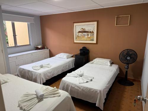 Postel nebo postele na pokoji v ubytování Casa hotel la 33