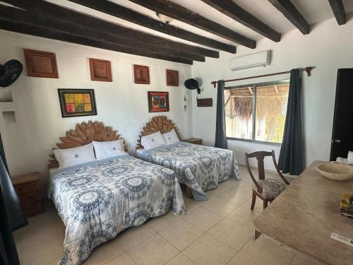 Katil atau katil-katil dalam bilik di All inclusive Punta Allen Luxury private Villa
