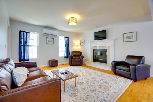 a living room with a couch and chairs and a fireplace at Group Getaway about 15 Mi to Charlottesville! in Zion Crossroads