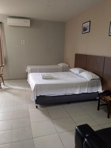 Katil atau katil-katil dalam bilik di Eldorado Inn