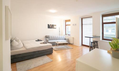 Posezení v ubytování Helles Apartment nähe Uni-Klinik mit Super Lage - W-Lan - Balkon in den Innenhof