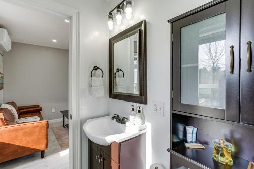 a bathroom with a sink and a mirror at Entire Private Home 2BR 2BTH Quite Area with parking in Lynn