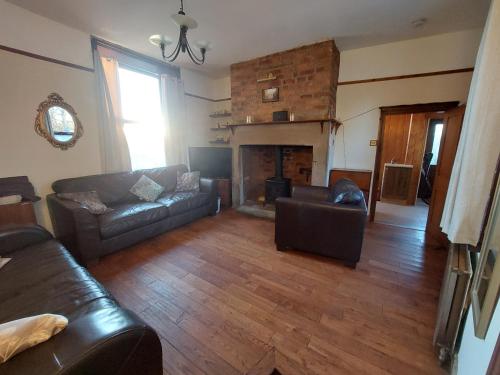 Χώρος καθιστικού στο Relax at the Cosy Snug Glossop