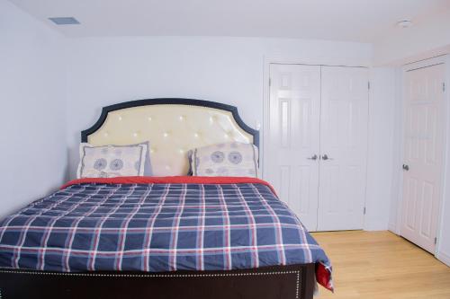 Ένα ή περισσότερα κρεβάτια σε δωμάτιο στο Cozy relaxation haven 1 Bedroom basement