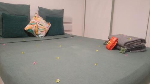Postel nebo postele na pokoji v ubytování Studio cosy à Bas-du-Fort
