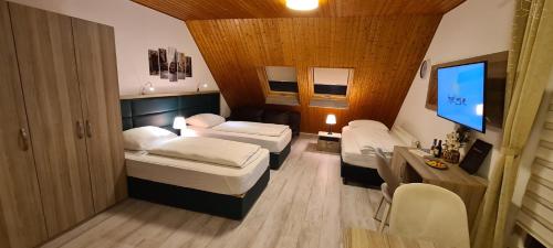 Ένα ή περισσότερα κρεβάτια σε δωμάτιο στο Ferienwohnung-32609 W4
