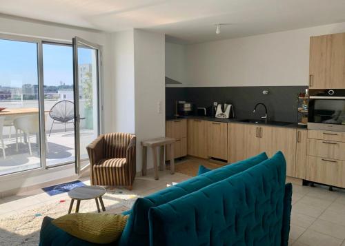 Photo de la galerie de l'établissement L'Artisane-Duplex en bord de Vilaine, à Rennes