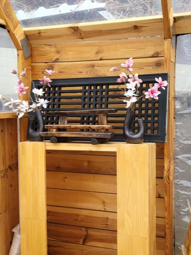 a wooden box with flowers on top of it at Wonju Aunt Home in Wonju