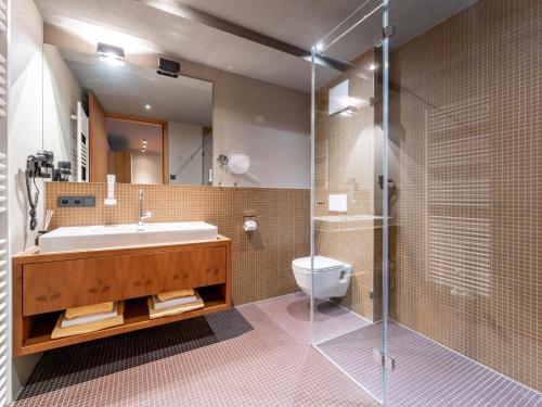 Koupelna v ubytování Tauern Suites Mitterwirt TOP 122